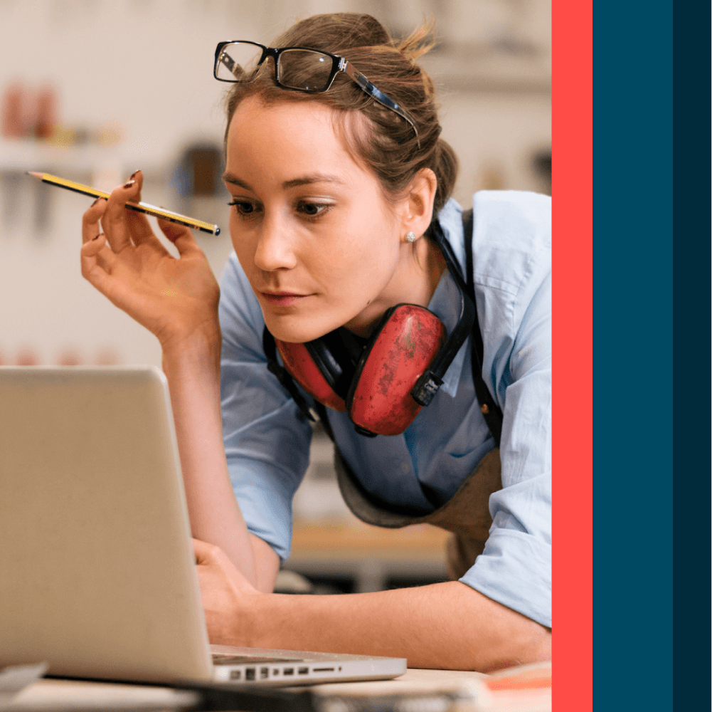 Person leaning into laptop to learn more